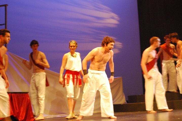 Odysseus (James Corrigan), Athena (Sarah Perry) and the Suitors